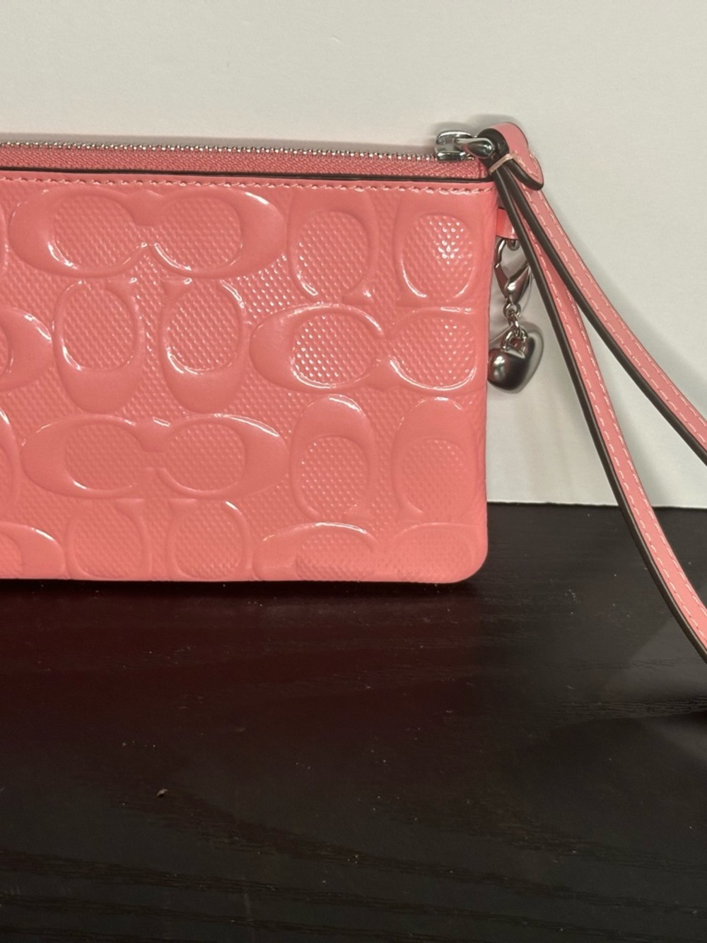 Corner Pink Patent Zip Embossed Wristlet In Signature Leather With Heart Charm - Picture 6 of 9